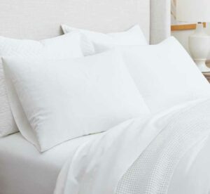 Boll and Branch flannel sheets A set of Boll & Branch sheets made on a bed.