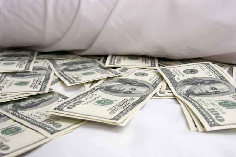money pours out of a mattress