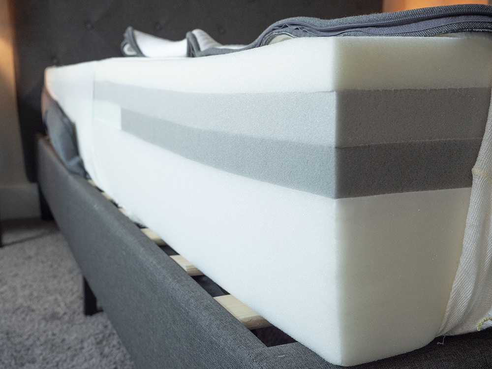 A mattress is opened to show its design.
