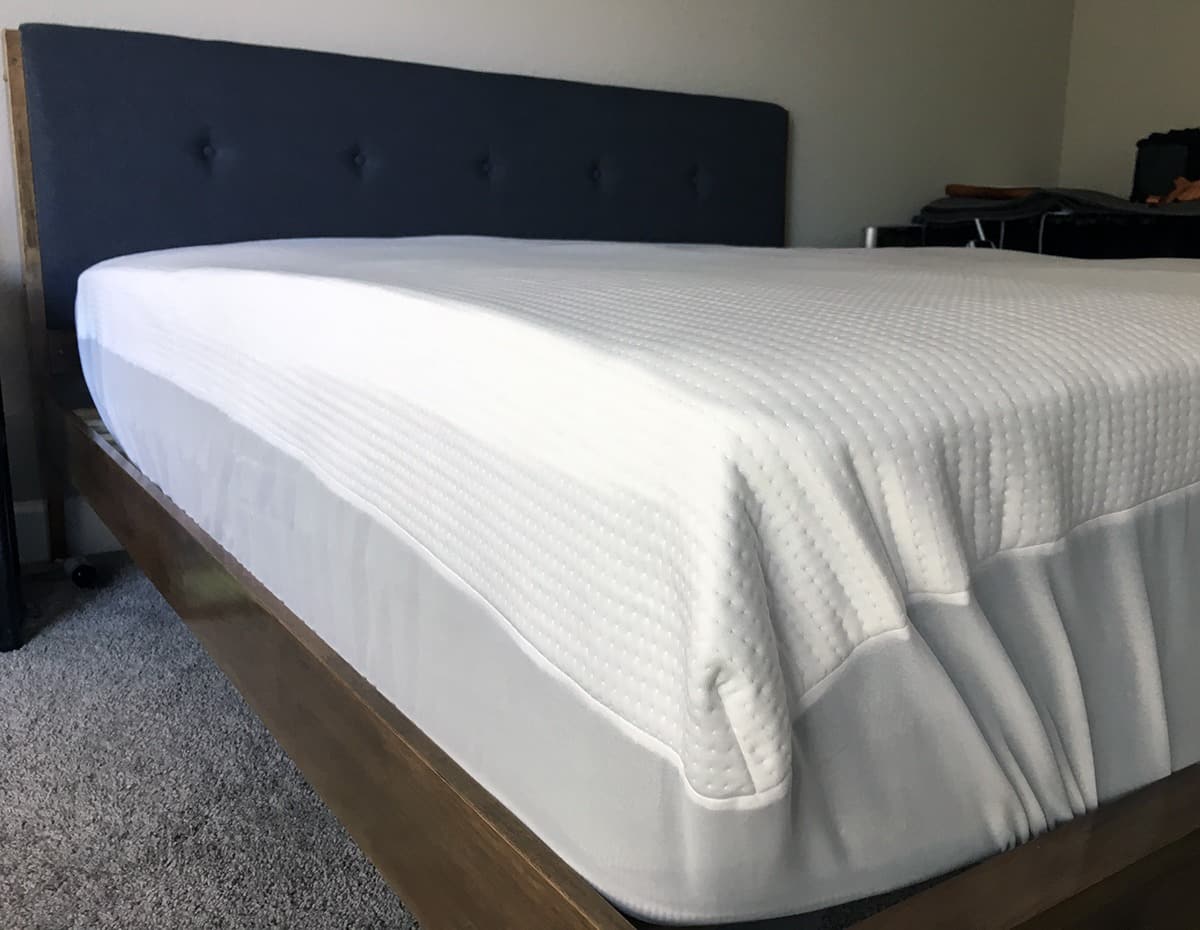Helix mattress protector on a bed.