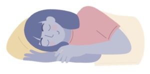 A woman sleeps on a pillow