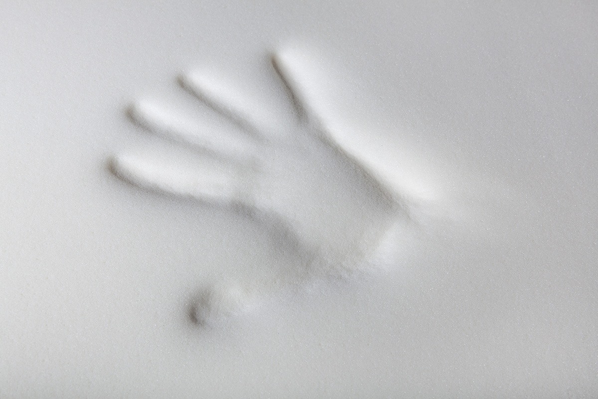 A handprint in memory foam