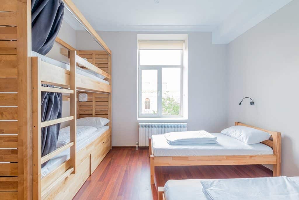 room with bunk beds and twin beds