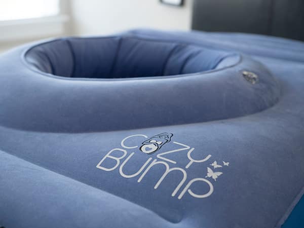 The Cozy Bump pillow helps pregnant women stomach-sleep