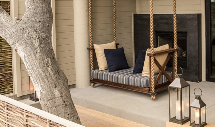 A wide shot of a patio with furniture