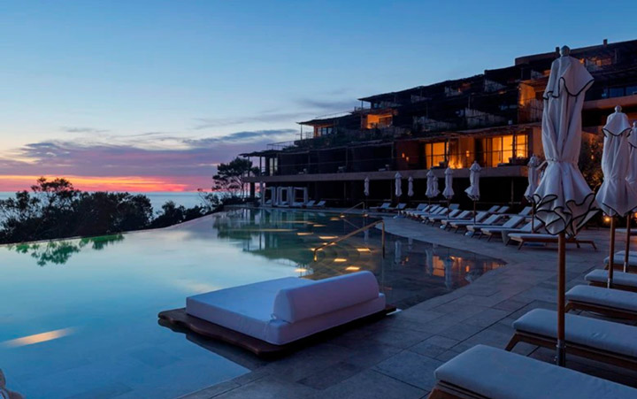 A wide shot of the Six Senses Ibiza hotel pool