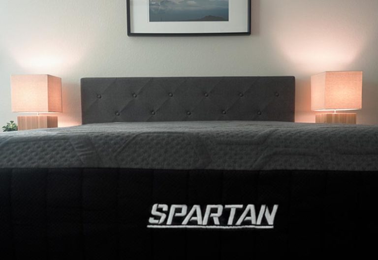 A close shot of the foot of a hybrid mattress.