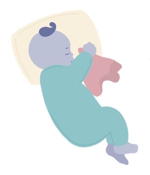 baby sleeping with a lovey and small pillow