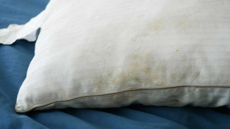 how to spot clean a pillow