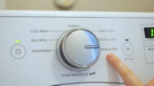 washing machine set to drain and spin cycle