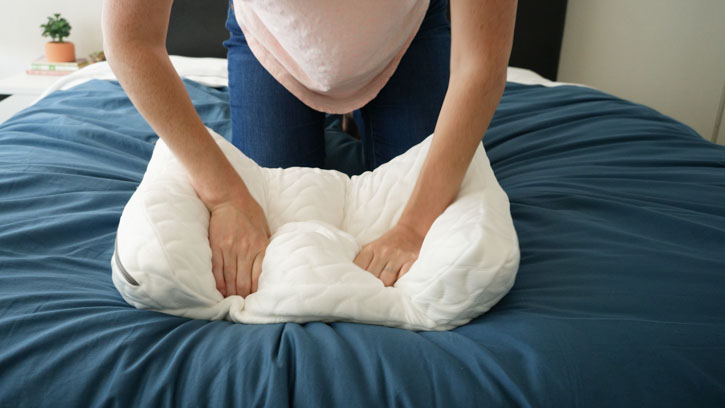 Woman Pressing Down On Extra Soft TEMPUR-Cloud Pillow