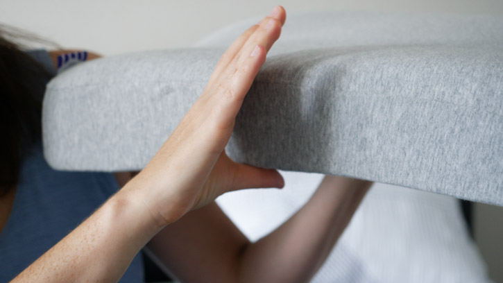 The pillow features raised edges in two heights - 4.3" and 3.1"
