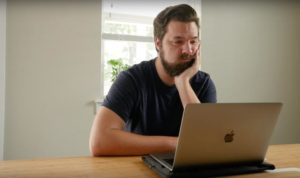 A man falls asleep at his table