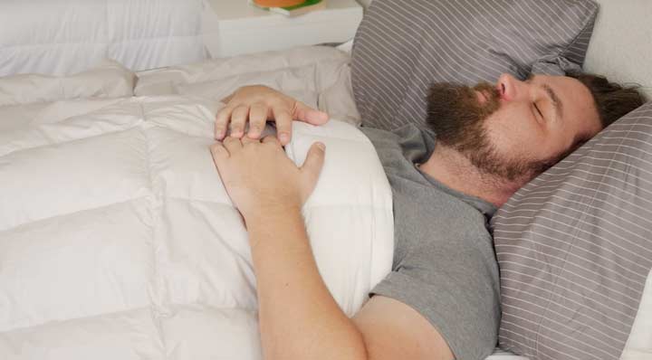 Back Sleeping Under Comforter