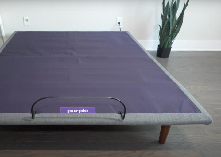 A wide shot of the Purple Ascent in a modern bedroom
