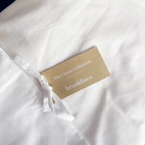 The best linen sheets: an image of a bag with a tag that reads: "the linen collection - brooklinen"
