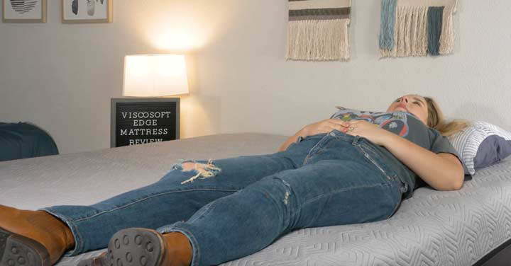a woman sleeps on the Viscosoft Edge Hybrid mattress