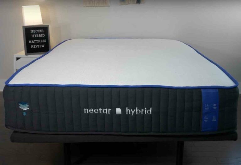 A wide shot of the Nectar Classic Hybrid on a modern bed