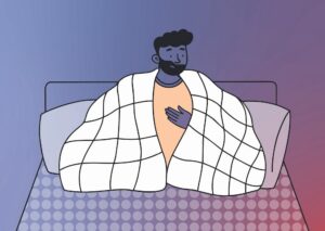 Man in bed unable to sleep