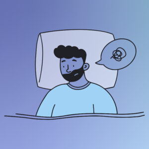 anxious man lying in bed
