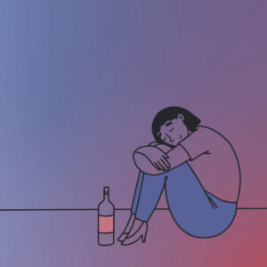 tired woman with bottle of alcohol