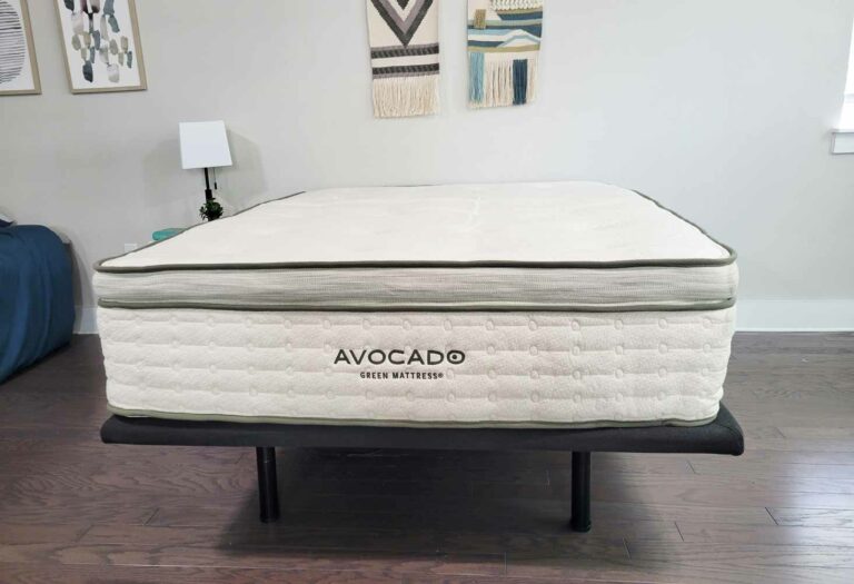 A wide shot of the Avocado Green mattress in a modern bedroom