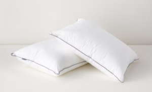 A screenshot of the tuft & needle down alternative pillows stacked on top of one another. A screenshot of the tuft & needle down alternative pillows stacked on top of one another.