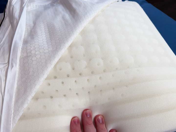A close up on the Nolah Cooling Foam pillow to show the ridges and perforations for airflow.