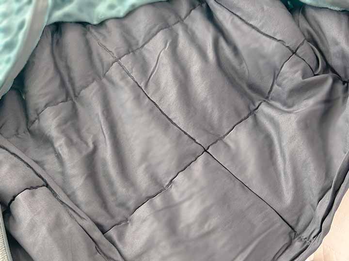 A close up image of the weighted insert for the Quility Weighted Blanket.