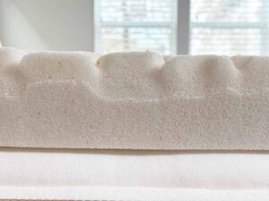 A close up image showing how thick the MOLECULE CopperWELL topper is.