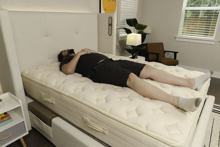 a man sleeps on his back on the Bear Natural