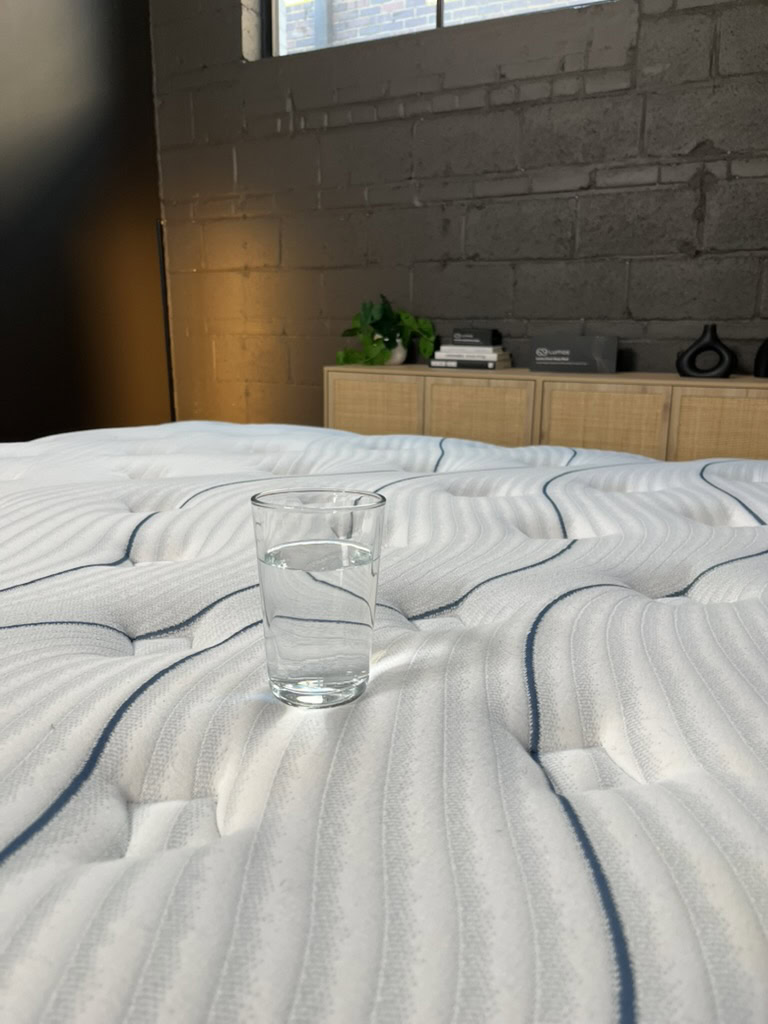 Glass of water on the Bear Elite Hybrid for the motion isolation test