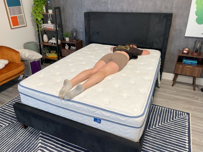 A person lays on their stomach a the DLX Premier Hybrid