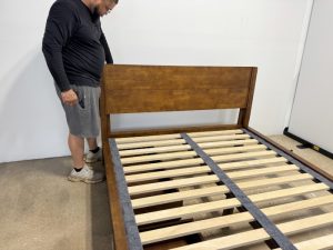 Our tester finishing assembly of a Thuma Classic Bed Frame