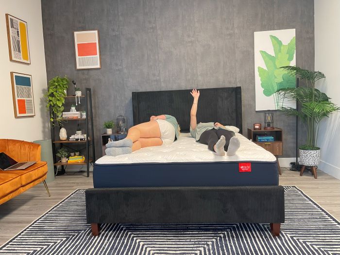 Testers lay on the bed testing motion isolation