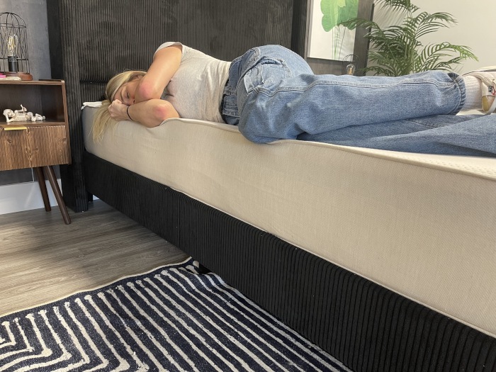 Full body edge support test on a Boring Hybrid Mattress