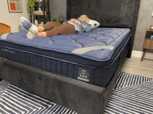 Our tester back sleeping on a DreamCloud Luxe Hybrid