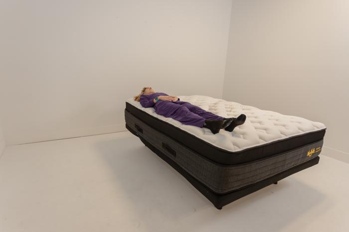 Our tester back-sleeping on the Nolah Evolution Mattress.