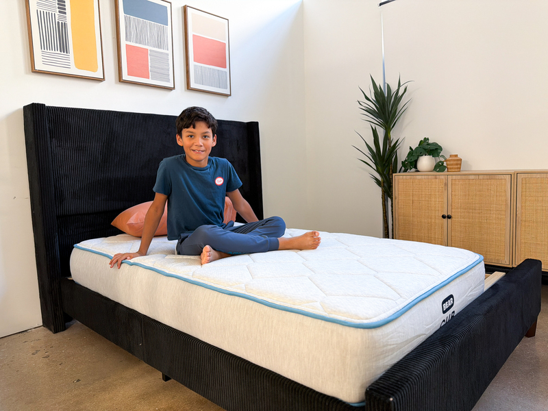 A young tester sits on top of the Bear Cub.